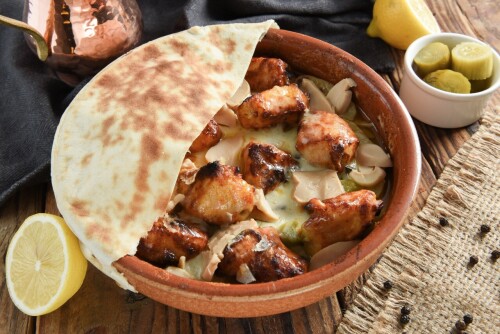 Image for 'فخارة طاووق بالبشاميل' Item